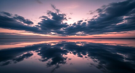 Sunset Reflection with Calm Water, and Clouds.