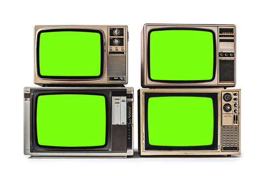 Four old retro style televisions with chroma key green screen for designers, isolated on white background with clipping path.
