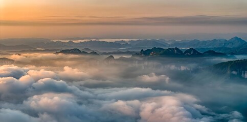 Mountain Peaks Emerging Through Sea of Clouds at Sunrise, Yichang China Misty Landscape