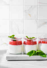homemade yogurt in jars with strawberries