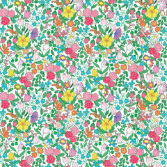 Colorful ditsy floral seamless pattern with hand-drawn wildflowers. Cheerful spring meadow background for kids' apparel, fabric, and cottagecore designs.
