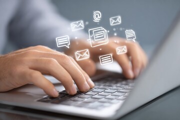 Obraz premium Person using laptop, email icons overlay