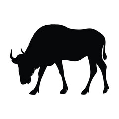 Wildebeest silhouette vector art illustration of african wildlife animal grazing in black and white design