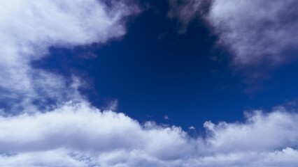A photograph of a vast, clear blue sky with soft, white clouds scattered at the bottom.A versatile background for websites, presentations, quotes, or any design needing clarity.