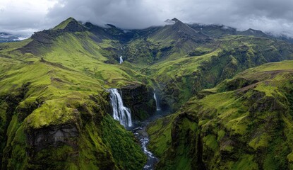 Panoramic view of a verdant Icelandic valley with waterfalls