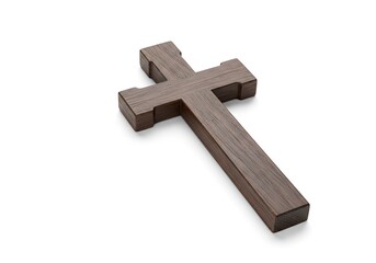 A wooden Christian cross lies diagonally on a white background