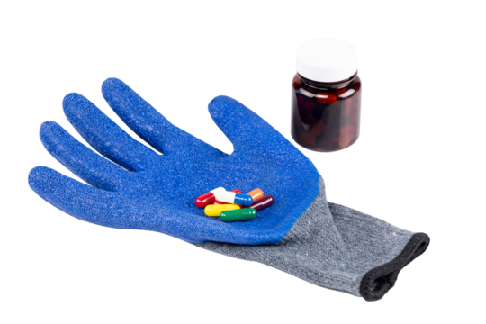 Workplace safety and industrial health concept with medicine pills on a protective glove. isolated on white background with clipping path.