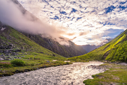 View enroute to Hampta pass hiking trail during sunset near 'Balu ka ghera' camp site, it is a dramatic crossover trekk at 14000 feet near Manali, Himachal Pradesh, India.