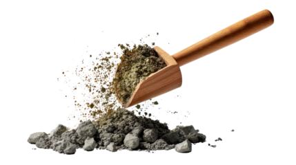 Scoop of gray powder: A wooden scoop gracefully releases a cascade of gray powder, the grains suspended mid-air and falling onto a pile, creating a textural and visually captivating image.