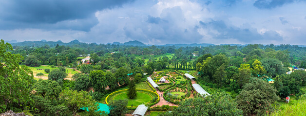 Panoramic view of Pachmarhi valley having clouds and mist shrouded hills rolling on each other from Pandava Caves top point in Pachmarchi, Madhya Pradesh, India.