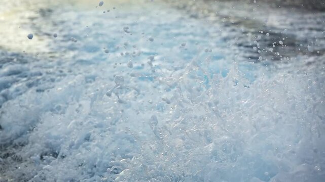 Water Spray Behind the Stern of a Motorboat. Slow Motion