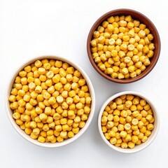 Fresh Yellow Corn Kernels in Bowls on White Background
