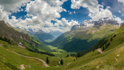 Naklejka premium Winding Alpine Road Through Majestic Mountain Landscape