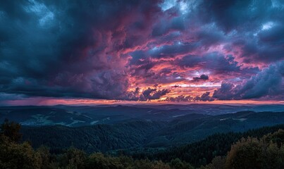 Fototapeta premium Dramatic sunset over a valley
