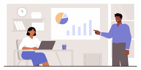 Man presenting a business chart and graph to a woman working on a laptop in an office setting