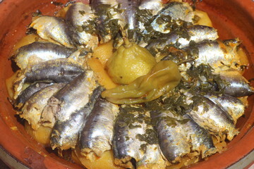 Traditional Moroccan Tajine with sardines and vegetables