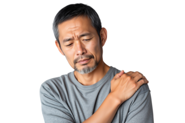 Senior man with shoulder pain, holding his aching shoulder in discomfort