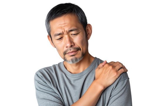 Senior man with shoulder pain, holding his aching shoulder in discomfort
