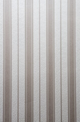 Elegant textured wallpaper design featuring subtle vertical stripes