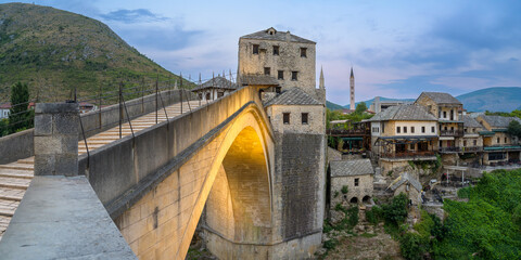 Majestic beauty of Mostar Old Bridge illuminated at dusk in Bosnia and Herzegovina