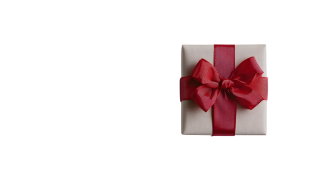 Elegant gift box with luxurious red ribbon bow, perfect for celebrations and special occasions, Isolated on white background