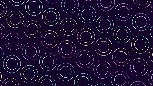 A mesmerizing circular pattern of purple and blue circles against a black background in this colorful and visually striking image