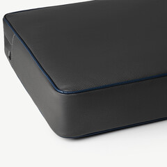 Close-up of stylish gray leather briefcase with blue trim on white background