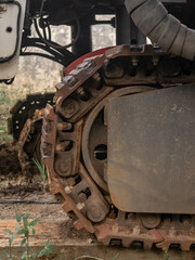 Rusty Tank Tracks on a Heavy Machine
