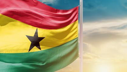Ghana national flag waving in an amazing sunlight. National flag wavering on mast.