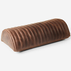 Brown leather motorcycle seat resting on white background