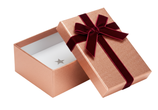 Isolated glimmering rose-gold gift box featuring a plush burgundy ribbon sitting ajar, glamourous