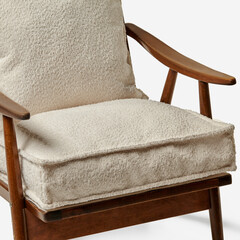 Comfortable bouclé fabric armchair with wooden structure on white background