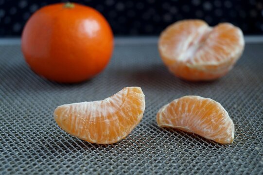 fresh mandarin slices, citrus fruits, macro