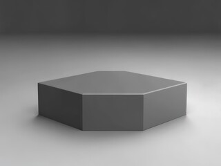 A simple, gray, hexagonal pedestal isolated on a light gray background.