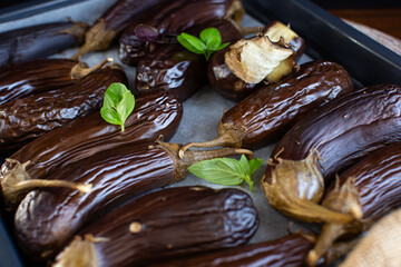 juicy eggplants with crust and herbs fragrant still life