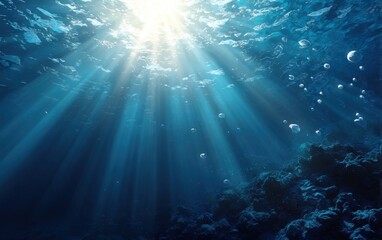 Fototapeta premium Sunbeams pierce deep blue underwater world