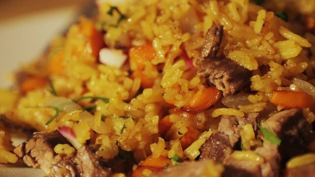 Authentic Chinese and Asian fried rice with egg and vegetables in wok top view on rustic concrete table background. Traditional dish of China with space for text