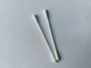 Cotton buds isolated on white background, personal care accessory commonly used for ear cleaning and hygiene.