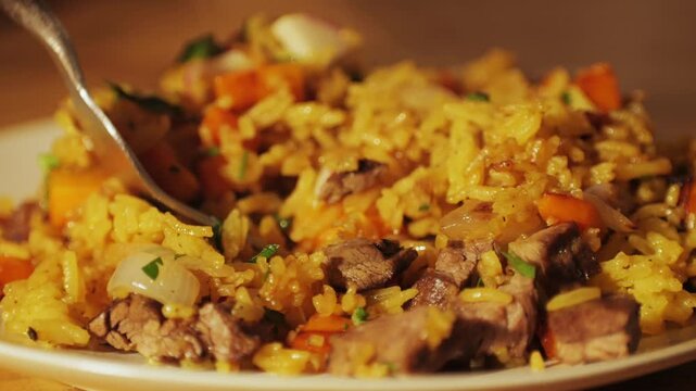 Authentic Chinese and Asian fried rice with egg and vegetables in wok top view on rustic concrete table background. Traditional dish of China with space for text