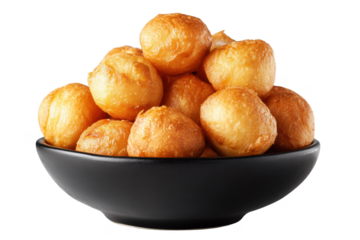 Golden fried dough balls piled high in a black ceramic bowl isolated on a transparent background food