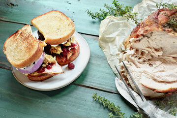 Overhead shot of homemade leftover Thanksgiving sandwich with turkey meat