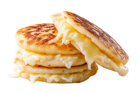 Stack of golden brown arepas stuffed with melted white cheese isolated on a transparent background food