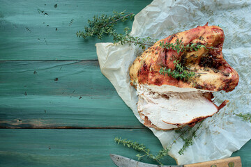 Overhead view of bone in carved turkey crown breast