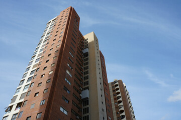 Benidorm, Spain &ndash; September 6 2025: High-rise apartment buildings with blue sky as the background