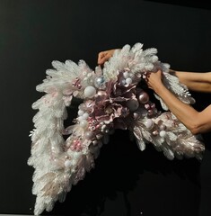 christmas wreath in the shape of wings