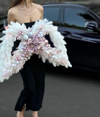 christmas wreath in the shape of wings