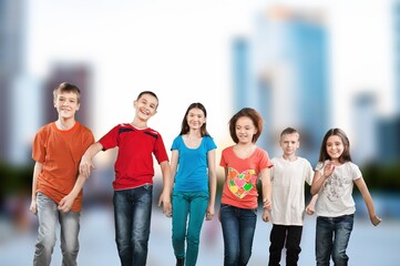 Obraz premium Multiethnic happy friends students hanging outside