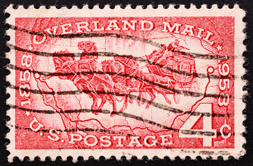 UNITED STATES OF AMERICA - CIRCA 1958.A stamp printed in USA shows horse carriage postage, celebrating 100 years of overland mail. Circa 1958