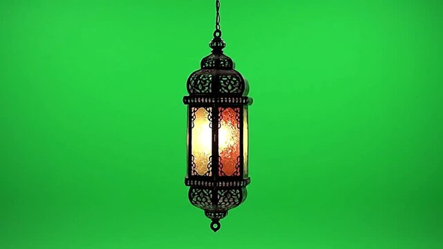 Ornate lantern glowing softly against a vibrant green screen backdrop with warm inviting ambiance for festive projects