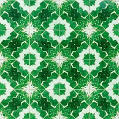 Intricate green and white tile pattern